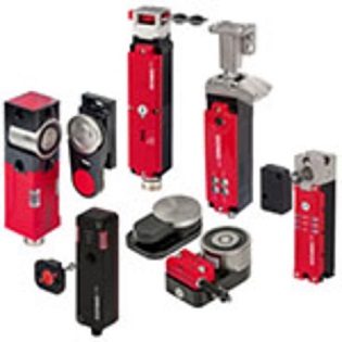 Transponder-coded safety switches with guard locking